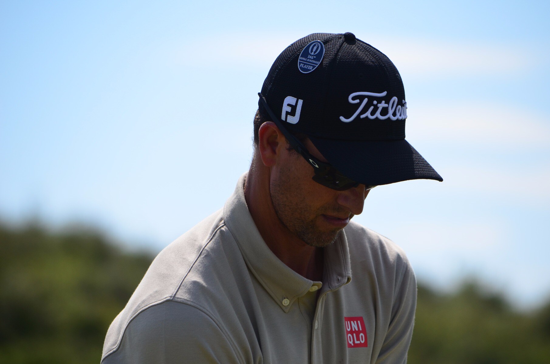 Adam Scott dons The Open player Badge at the 18th...