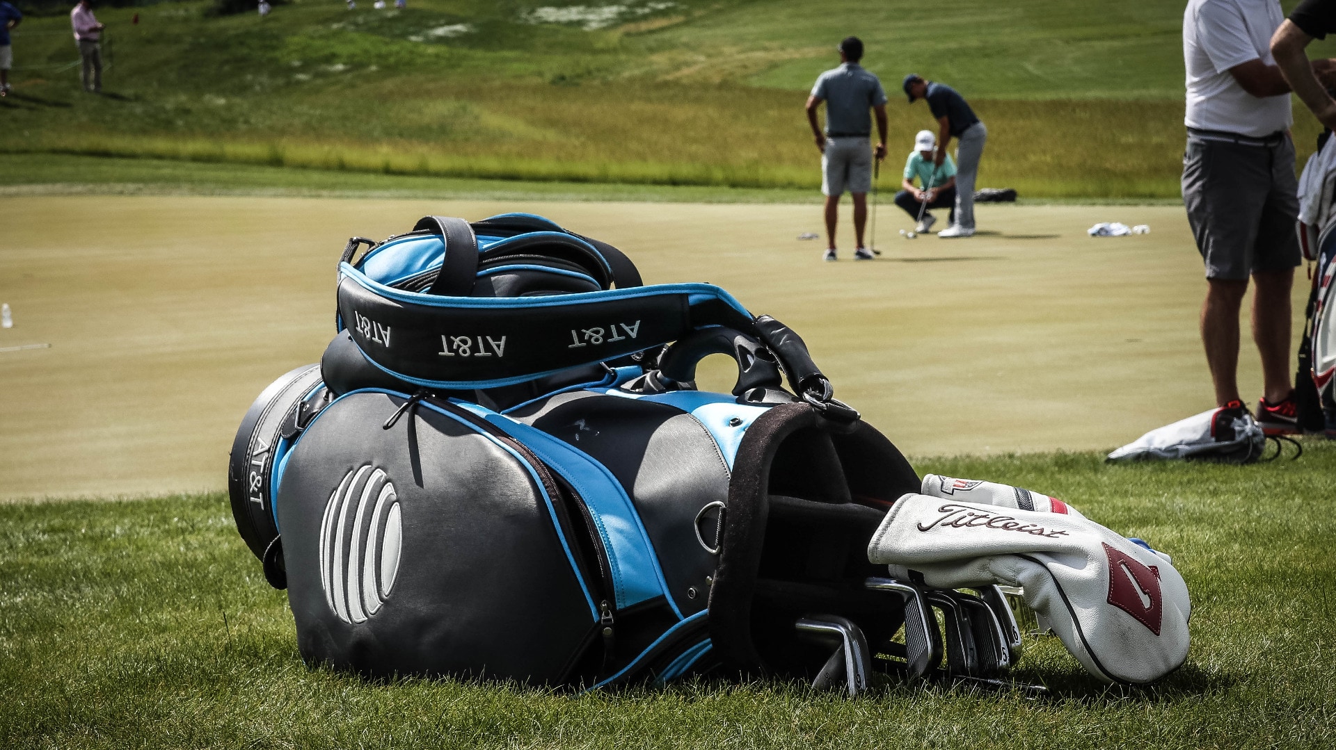 Jordan practices as his bag full of Titleist equip...