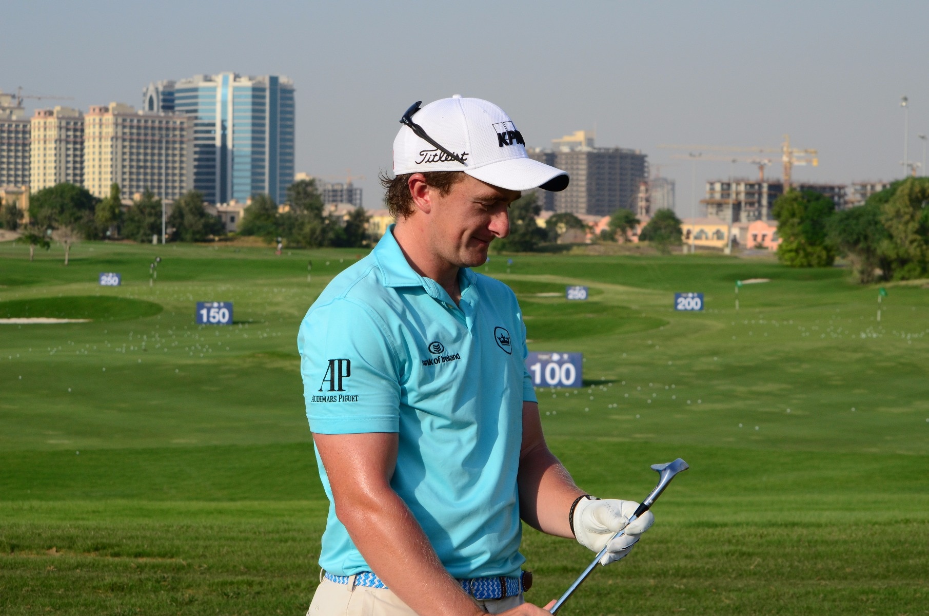 Paul Dunne is all smiles after taking his new SM7...