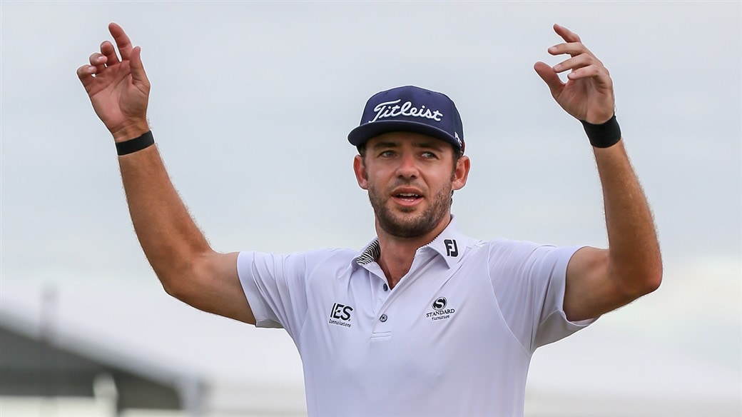 Lanto Griffin Raises his arms in triumph after winning the 2019 Houston Open