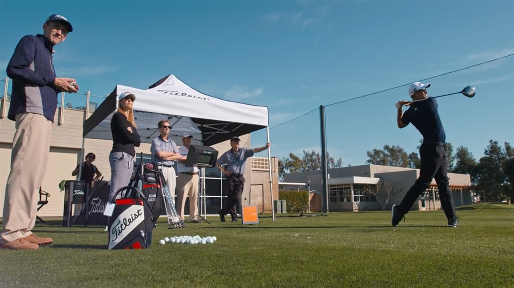Titleist Tour Consultant for Titleist Golf Ball R&D, Fordie Pitts, observes ball flight during testing with Adam Scott at Titleist's Oceanside Test Facility.