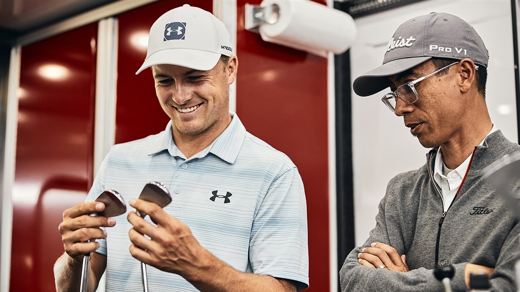 Jordan Spieth gets his first look at new Titleist T100 irons and learns about the new design from Marni Ines, Titleist Director of Iron Development