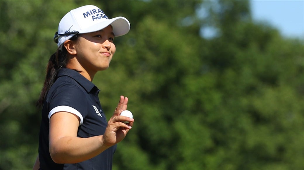Sei Young Kim smiles and raises her Pro V1 golf ball after winning the LPGA Marathon Classic