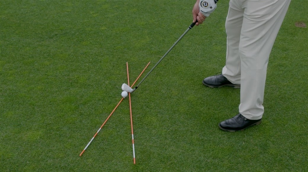 The proper setup and alignment in order to hit a fade (a shot that curves left-to-right for a right-handed golfer)