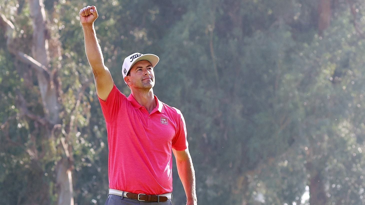 Adam Scott salutes the crowd after holing the winning putt at the 2020 Genesis Invitational