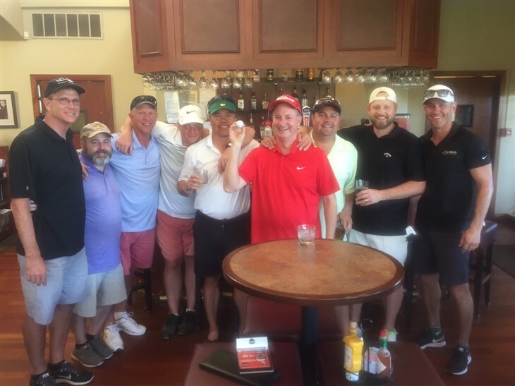 Out of town work outing hole in one