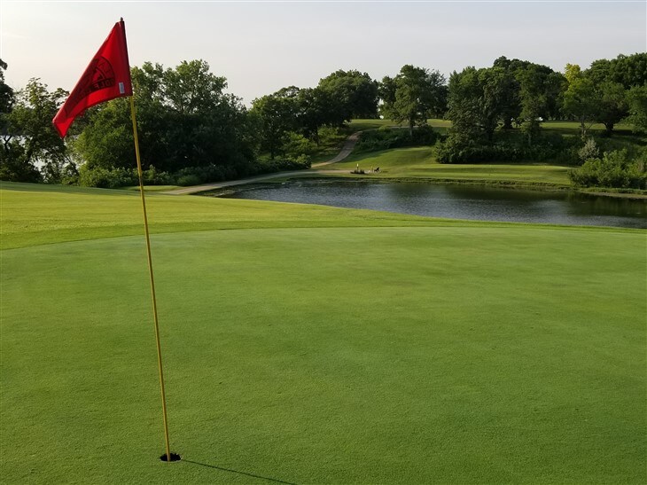 718 ap2 7 iron. Uphill into the wind.