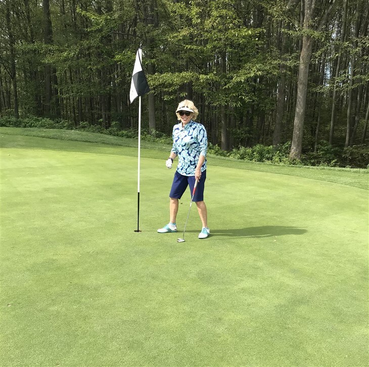 Woman makes hole in one right handed and one left handed